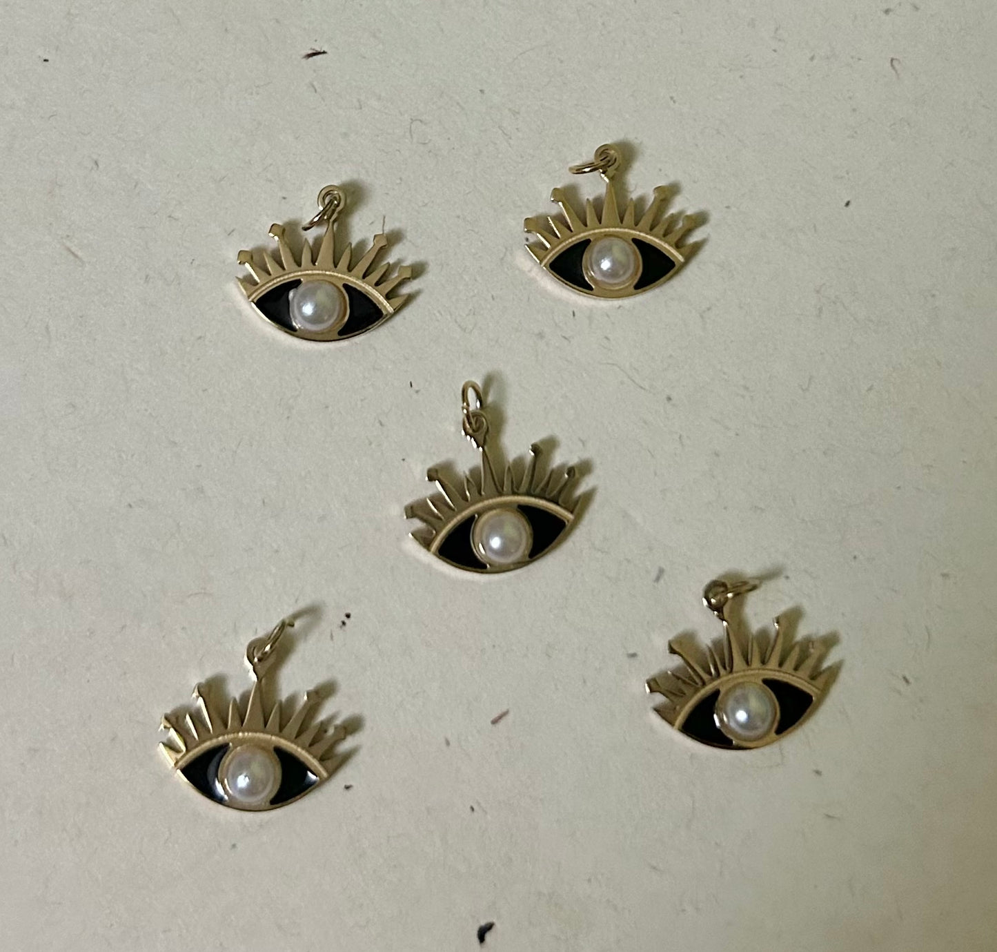 Eye got you charm C39