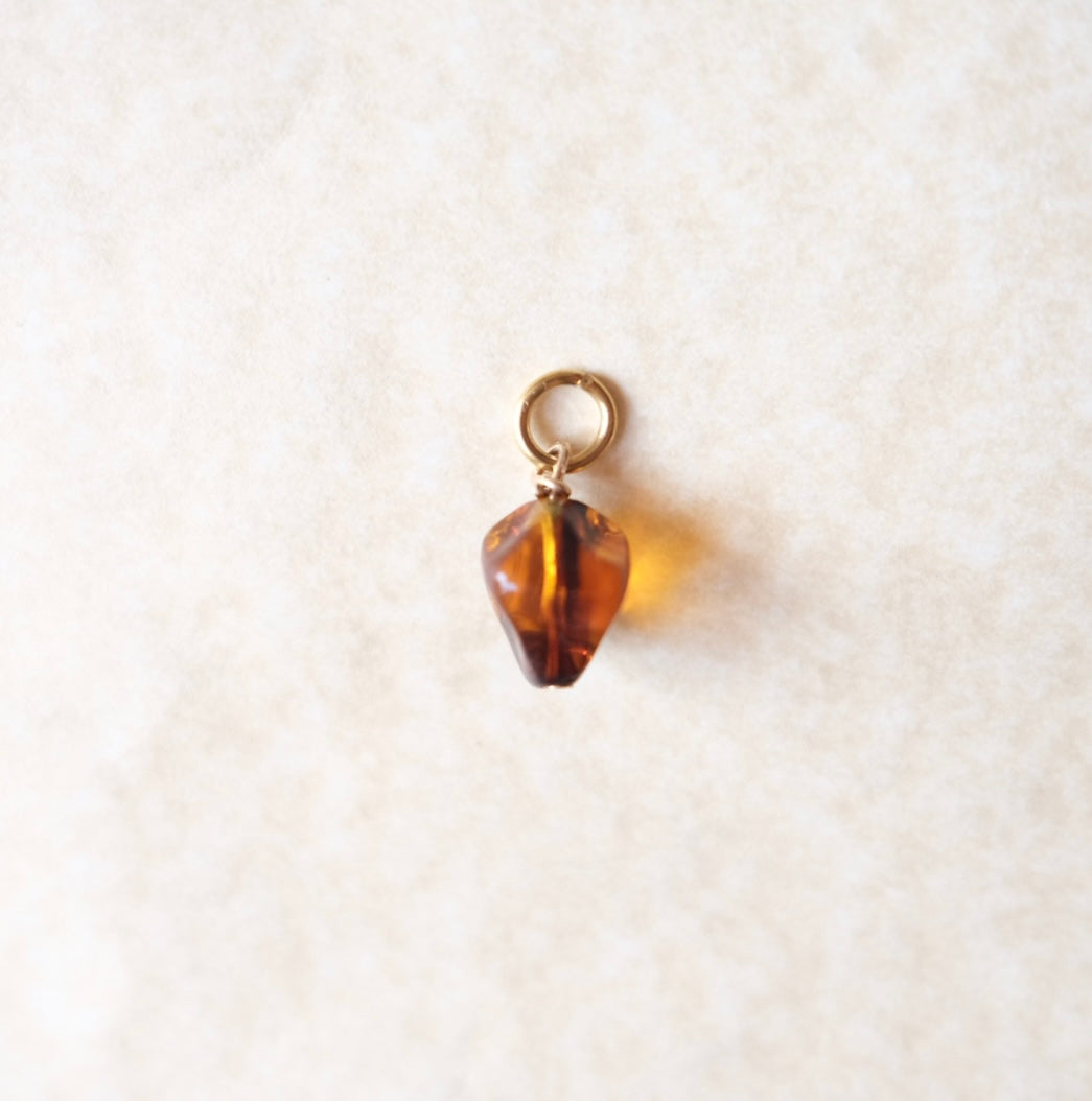 Brown oval charm C82