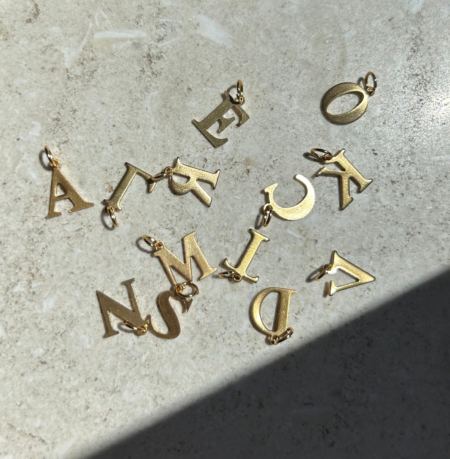 Personal initial charm