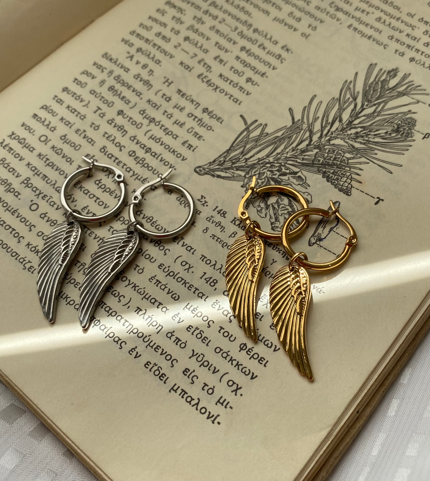 Jasmine's wings earrings E18