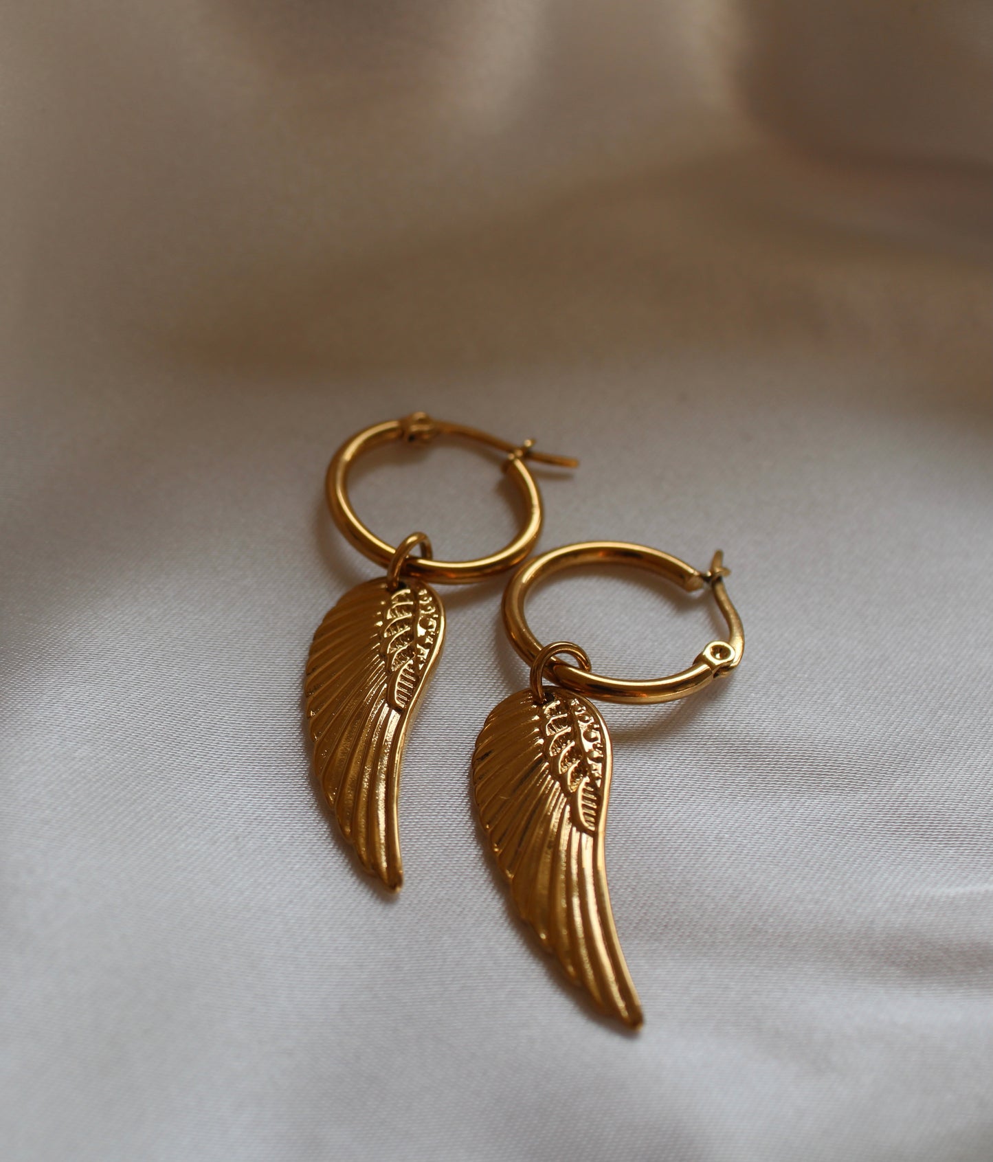 Jasmine's wings earrings E18